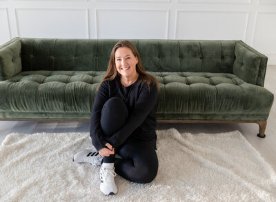Photographer seated on floor