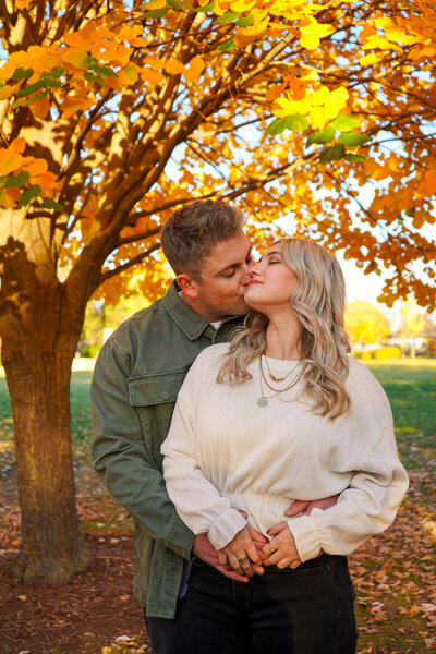 Fall backdrop couples photo