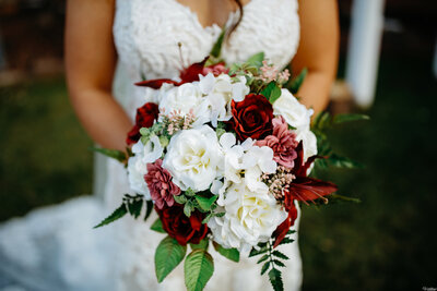 White and red round bridal bouquet