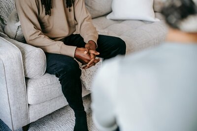 Patient talking to counselor during faith-based counseling in New Mexico