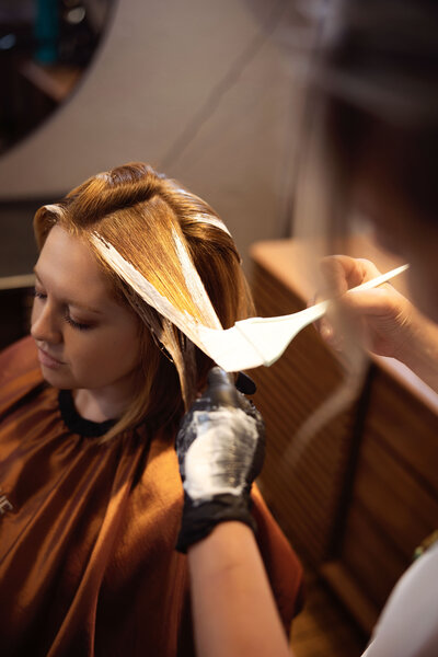 Professional haircut and styling at Intrigue Salon - premium beauty services in Menominee