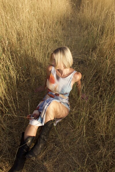 Jaiden sitting on white couch