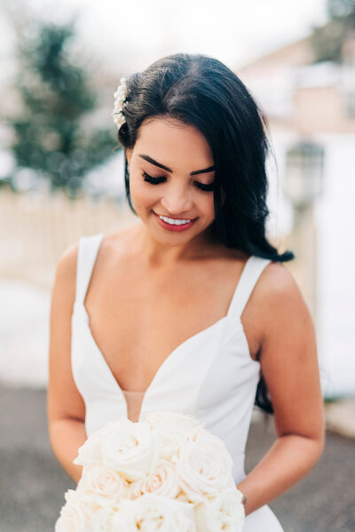 Classic bridal hair and makeup by Amplified Artistry, romantic & professional Calgary hair and makeup artist, featured on the Brontë Bride Vendor Guide.