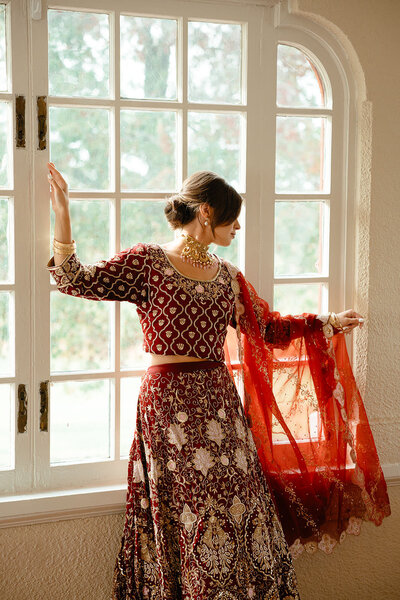 A person in a dress with their arms outstretched 