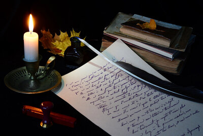 Photo of a student studying tarot in her witchcraft course