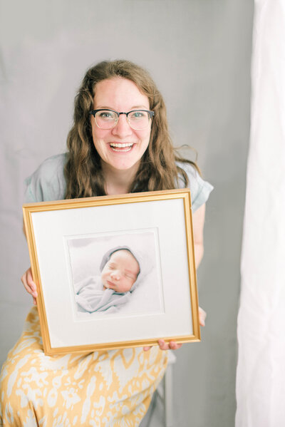 Coley K Photography with a newborn photo
