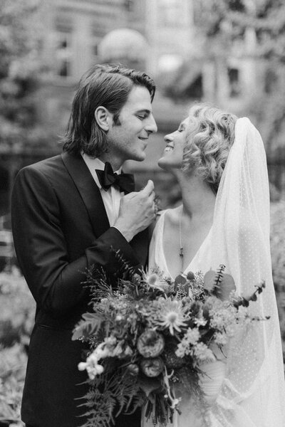 Couple laughing during their intimate wedding ceremony in Brooklyn, NY