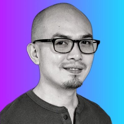 Dylan wears glasses and a goatee. 