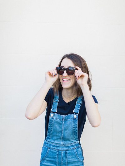 Charleston brand photographer Abby Murphy portrait wearing Madewell overalls