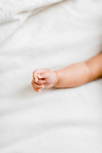 A sweet detailed image of a newborn's hand during a lifestyle session in Richmond, Virginia.