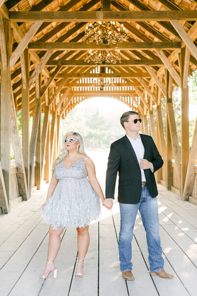 couple during engagement session at big sky barn