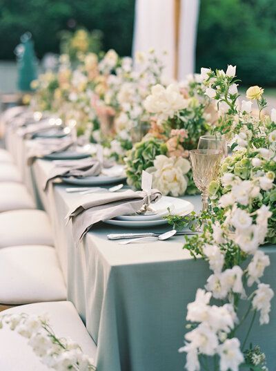 luxury wedding tablescape with lush floral design