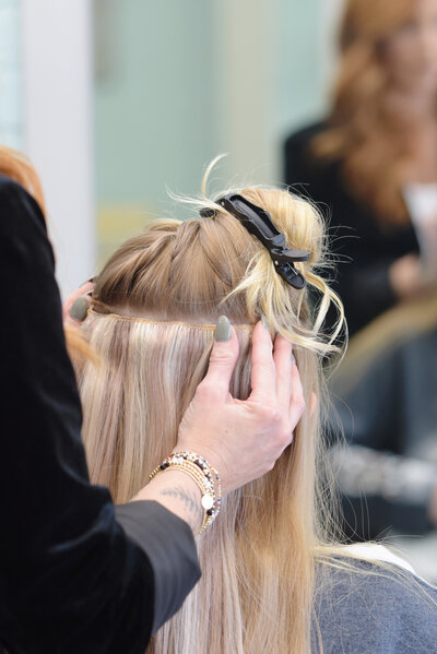 Prepping a client for hair extensions 