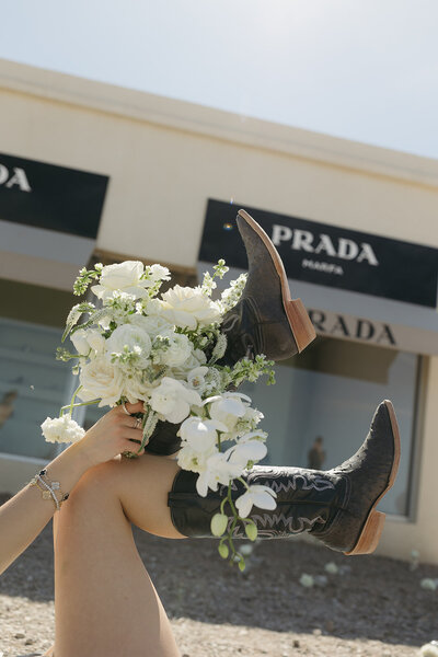 raleigh wedding photographer showcasing boots with white florals
