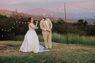 Wedding and Elopement Photography, bride and groom play lawn games during Airbnb intimate wedding.