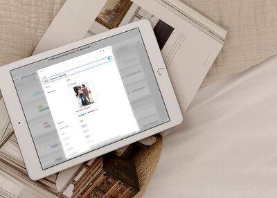 White iPad with screenshot of Social Media Manager Client Content Planner