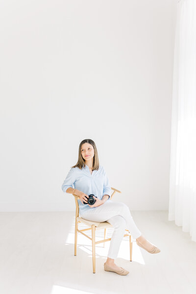 Lydia Suzanne Photography - headshot of an Austin Texas Photographer in a white studio.