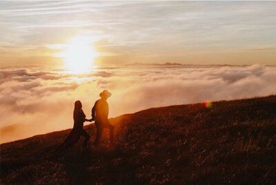 Couple at sunset on mountain