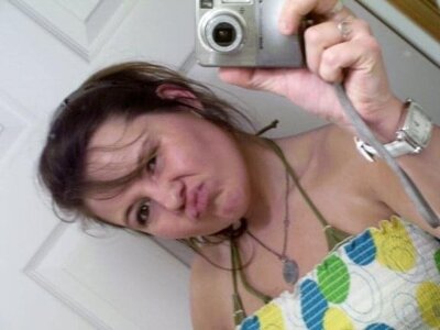 Hiliary Using an original digital camera for a mirror selfie