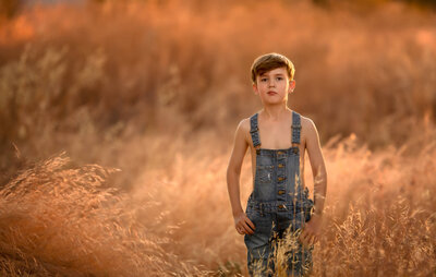 Boy in field in Kingman, Arizona
