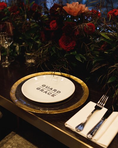 Black place setting for 40th birthday party