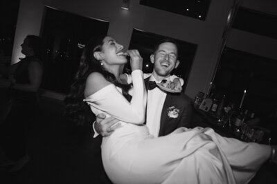 candid wedding photography of the bride and groom during their intimate wedding reception