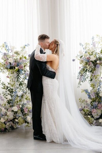 Bride and groom walk up memorial steps at their DC wedding