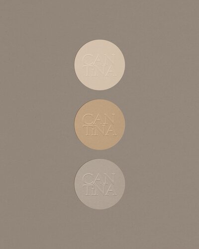 Modern logo design for a cocktail bar with sleek typography and a minimalist icon.