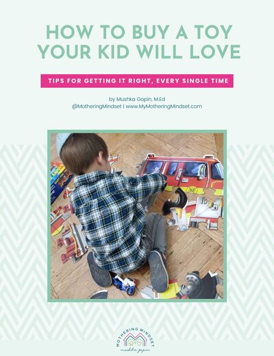 baby peering at Jewish contrast cards inserted into Lovevery playmat