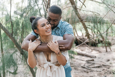 man & woman smiling