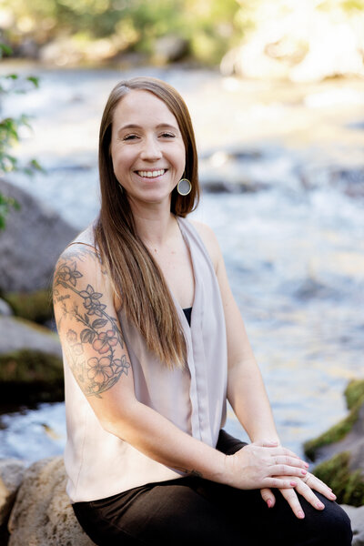 A lasy sitting in aa l