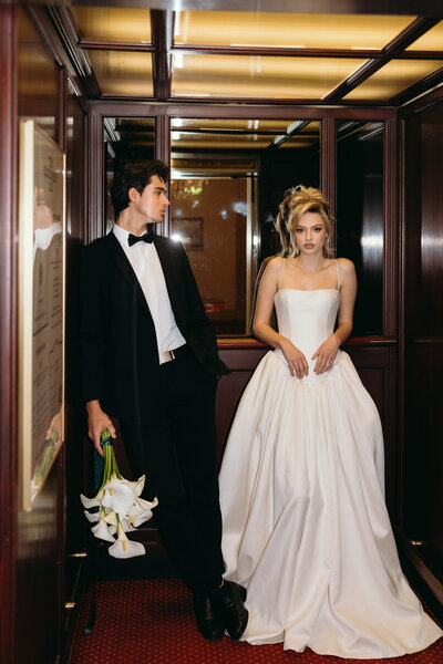 Wedding Portrait of bride and groom in elevator