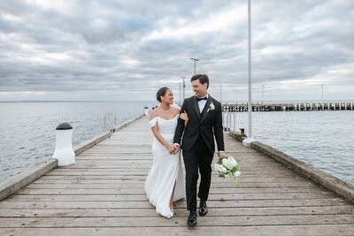 Bride and groom on the pier in Portsea Victoria