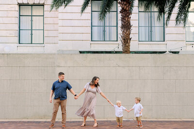 Groom kisses brides cheek before their Floridan Palace wedding in Tampa