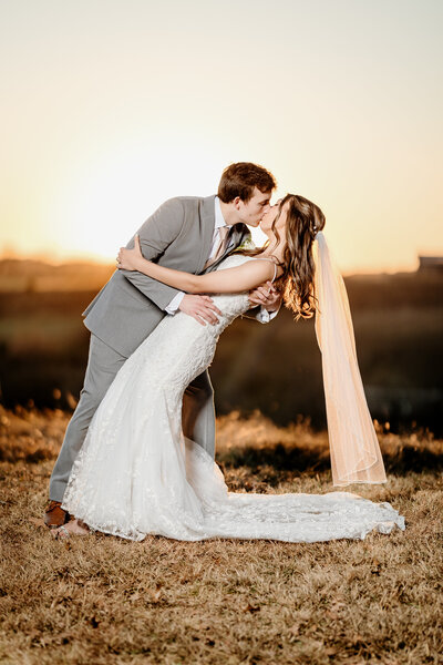 Wedding Couple outside at night with Cars