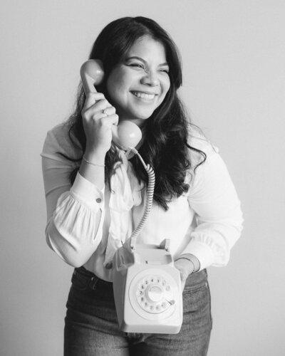 Marien-j-malloy-telefone-smiling-portrait
