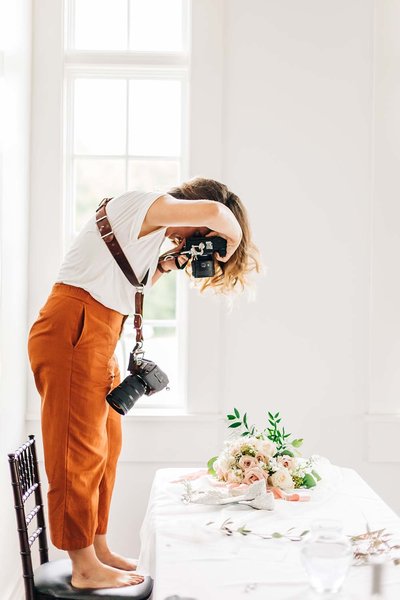 Virginia Wedding Photographer, Cat Deline taking a photograph of a table setting