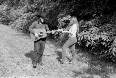 Bass guitar being put into a truck on 120mm film.