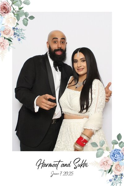 Couple pose together at their wedding reception
