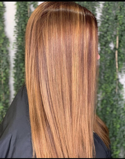 long straight red hair at the chosen feather salon