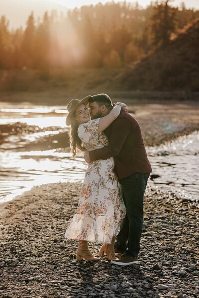 Engaged couple embraces during Colorado engagement session.