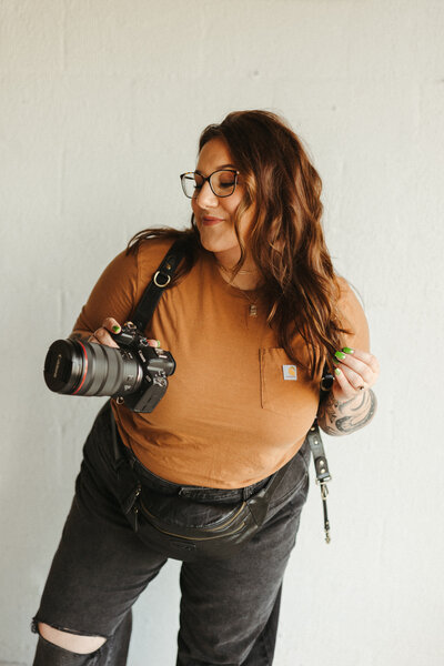 photographer holding camera