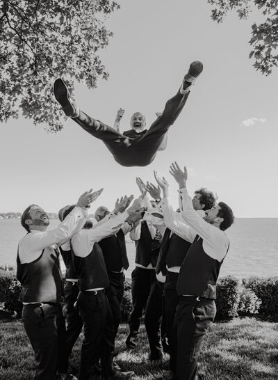 Groom tossed into the air, Maryland Wedding Photography