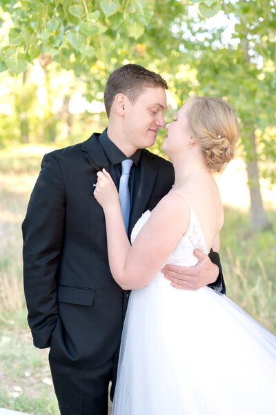Couple holding hands on elopement day at Garden of the Gods Park