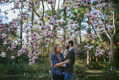 Gorgeous Engagement Photo of a CIS Straight Couple Cherry Blossom Tree in Tallahassee FL