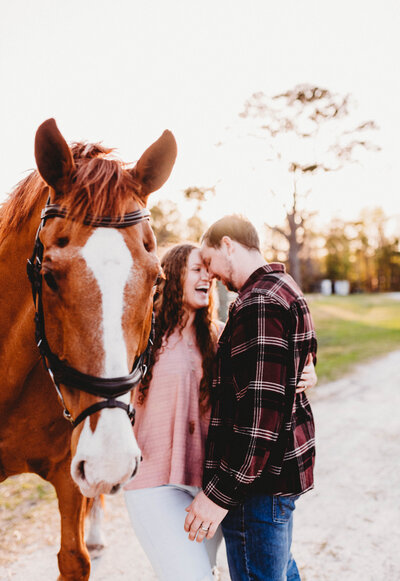 couples session with atticus the horse for this sweet couple in Jacksonville, North Carolina