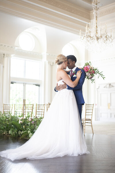 Bride and Groom during an intimate moment of their first look portraits