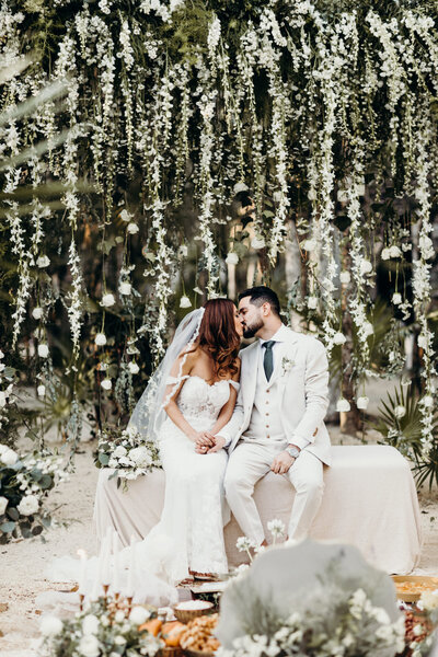 Couples first kiss in a Persian wedding in Tulum
