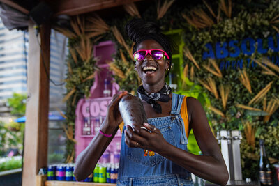 Guests raising glasses during the Chimera Immersive Dinner at The Norwood Club