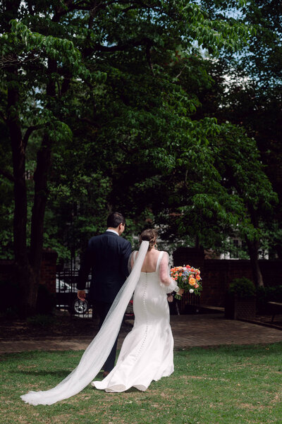 Kellen and Paul sharing a toast during their wedding reception in New York City.